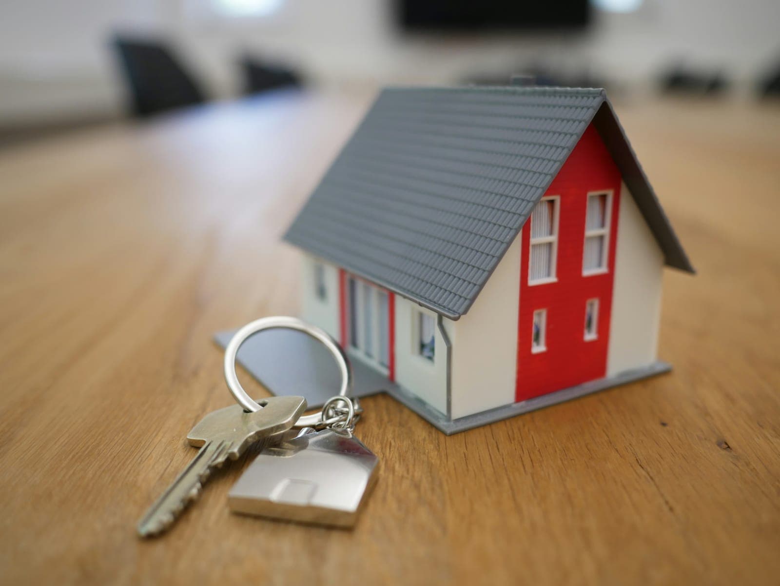 Happy family signing closing documents and receiving house keys